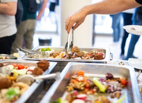 Food in chafing dishes on buffet table